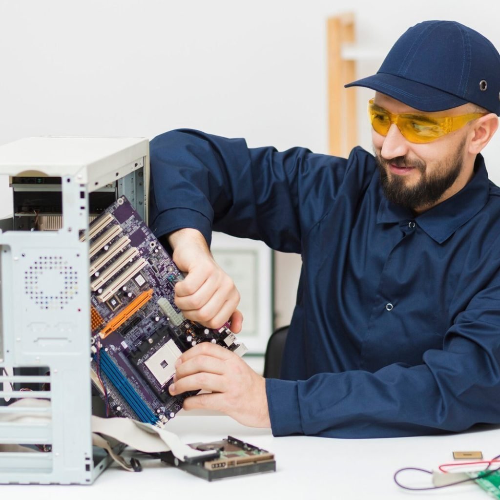 front-view-man-repairing-computer-1-scaled-1-1-1-1-1-1-1-1-1-1-1.jpg